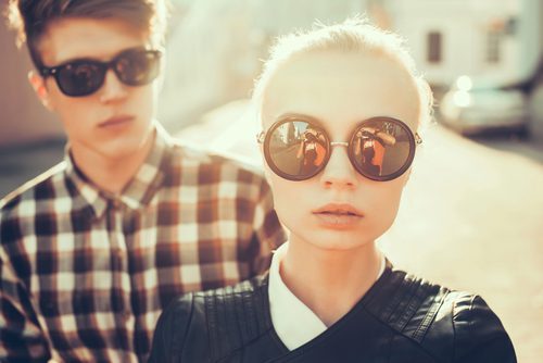 hip young couple in sunglasses