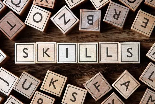 skills spelled out in wooden blocks