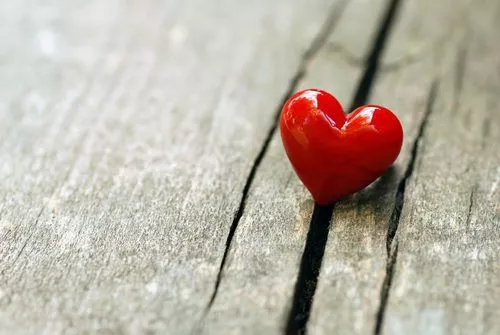 heart trinket on wood