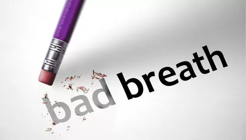bad breath spelled out - bad being erased with pencil