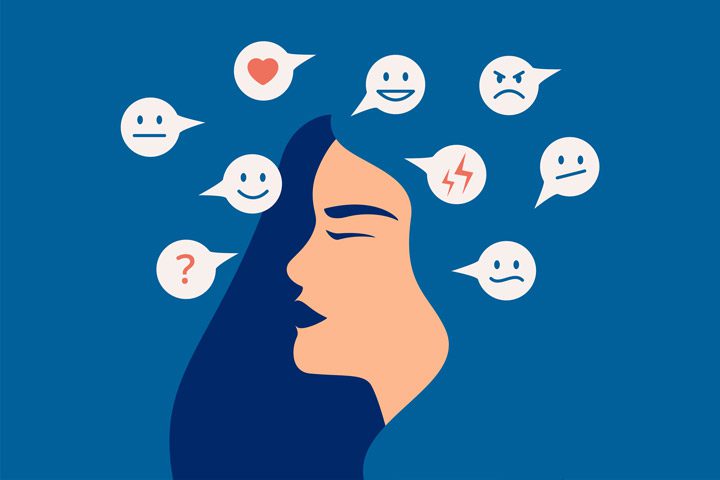 digital illustration showing side profile of a woman's face with little comment bubbles all around her head that have different emoticons in them like a sad face, heart, question mark, etc., against a blue background - Borderline Personality Disorder