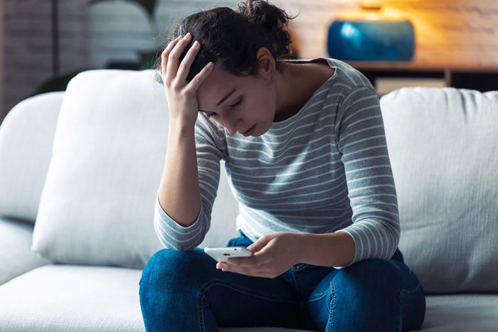 A woman looking worried.